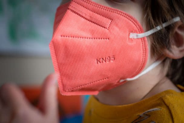 PHOTO: FILE - A child wears a KN95 protective mask for kids arranged in Hastings-on-Hudson, New York, Jan. 13, 2022. (Tiffany Hagler-Geard / Bloomberg via Getty Images, FILE)