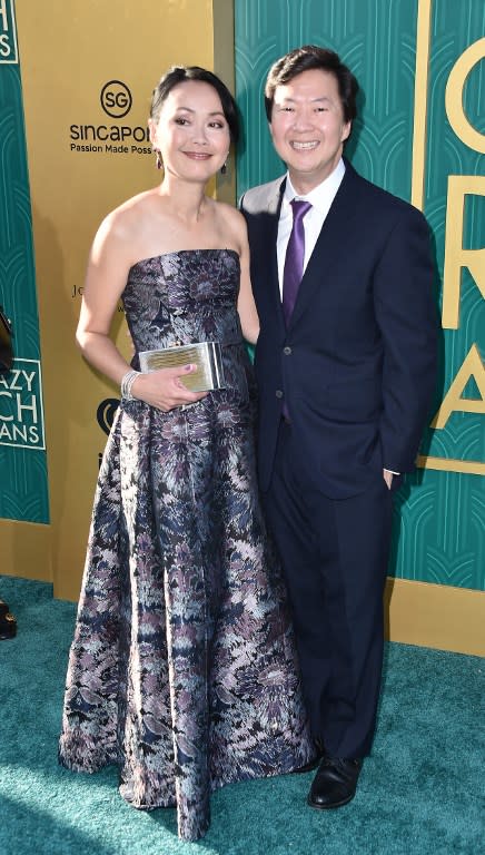 <p>Actor-comedian Ken Jeong (right) and his wife Tran attend the premiere of “Crazy Rich Asians” at the TCL Chinese Theatre IMAX in Hollywood, California on 7 August. (PHOTO: Alberto E. Rodriguez/Getty Images/AFP) </p>