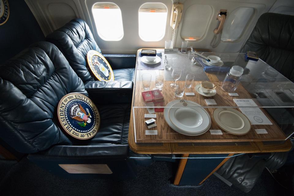 View of the fine dining dinner plates and stemware in the VC-9C aircraft during Cockpit Day at the Air Mobility Command Museum in Dover.