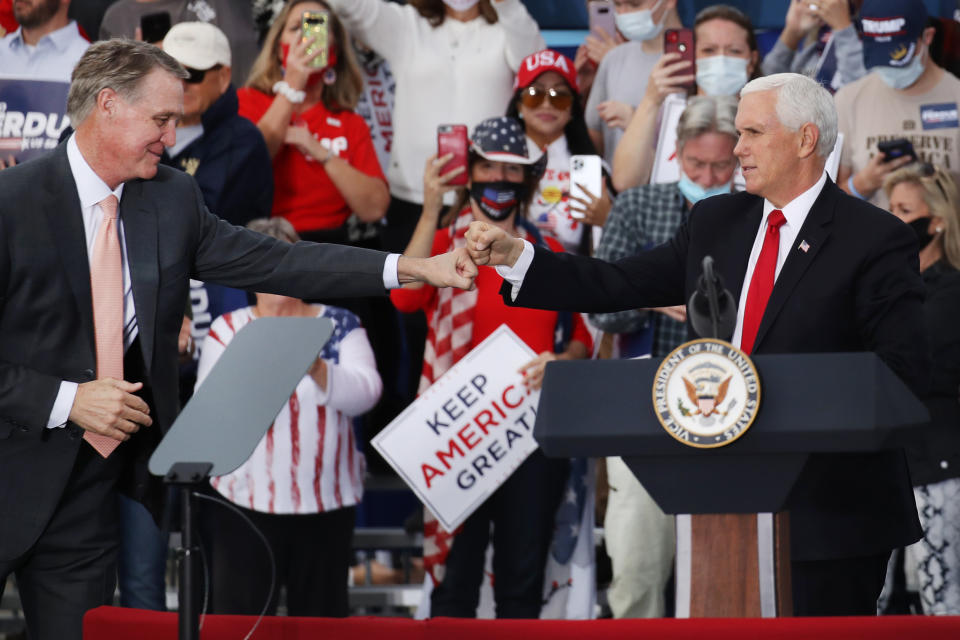 Vice President Mike Pence lends his support at a rally with Sen. David Perdue on Dec. 4 in Savannah, Ga. (Spencer Platt/Getty Images)