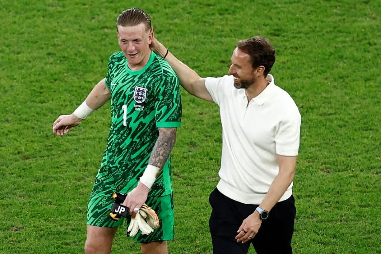 Gareth Southgate congratulates Jordan Pickford after England's Euro 2024 win against Slovakia (KENZO TRIBOUILLARD)