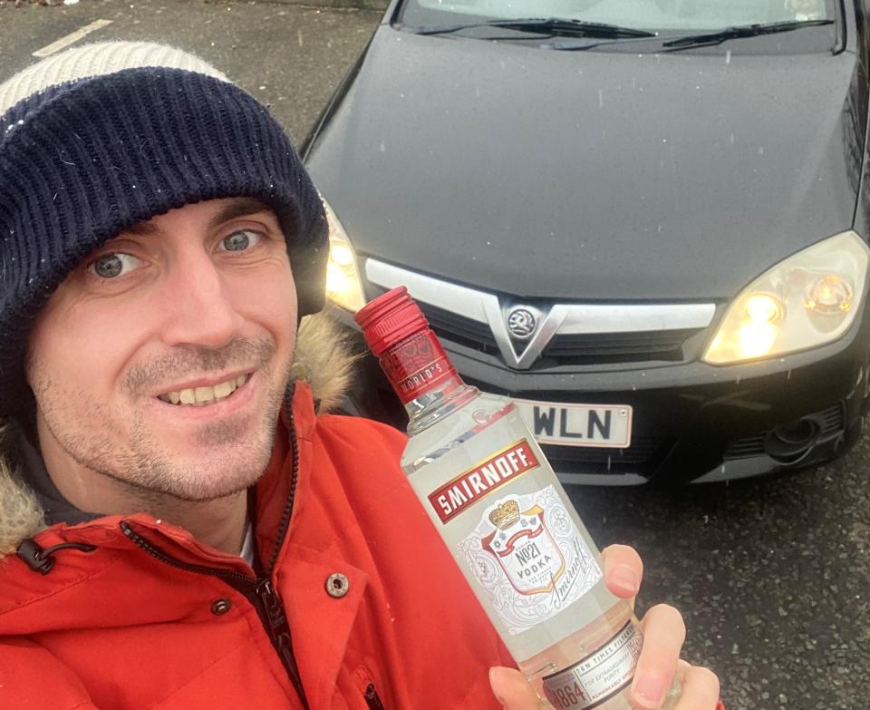 Jack Mentiply thinks he's found the perfect solution to icy car windscreens in the winter months - vodka. (SWNS)