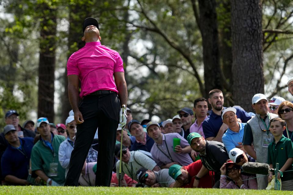 Tiger Woods reacts to his tee shot on the fourth hole during the first round at the Masters golf tournament on Thursday, April 7, 2022, in Augusta, Ga.