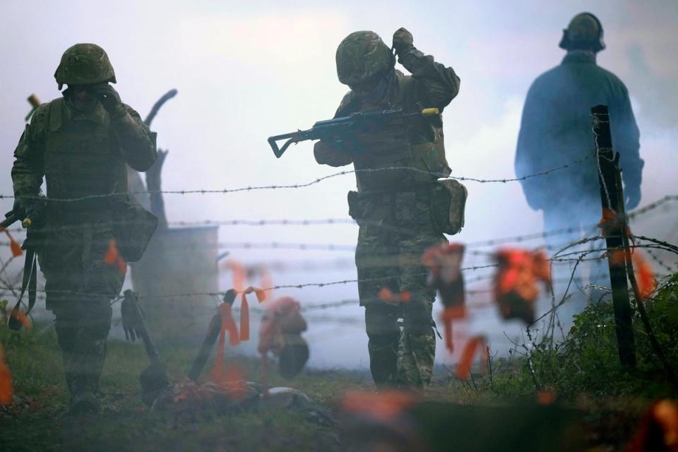 Ukrainian soldiers take part in a training excercise at the STANTA training camp in eastern England (POOL/AFP via Getty Images)