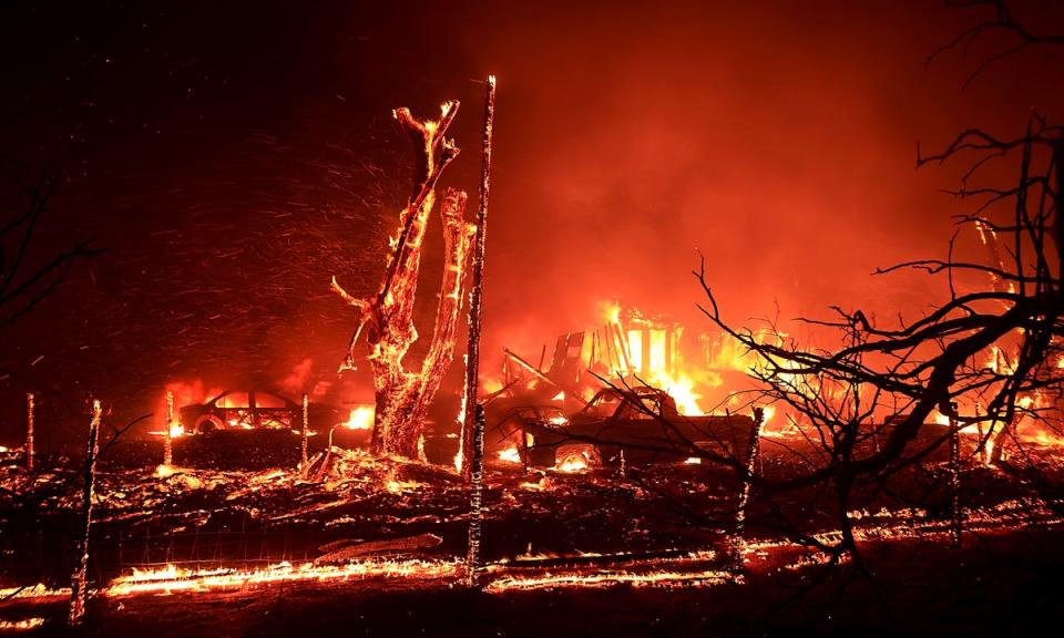 A home burns during the Corral Fire at Bernard and Stearman roads, west of Tracy, Calif., Saturday, June 1, 2024 (AP)