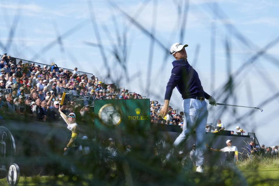 United States' Justin Thomas reacts after teeing off the 9th on the first day of the British Open Golf Championships at the Royal Liverpool Golf Club in Hoylake, England, Thursday, July 20, 2023. (AP Photo/Jon Super)