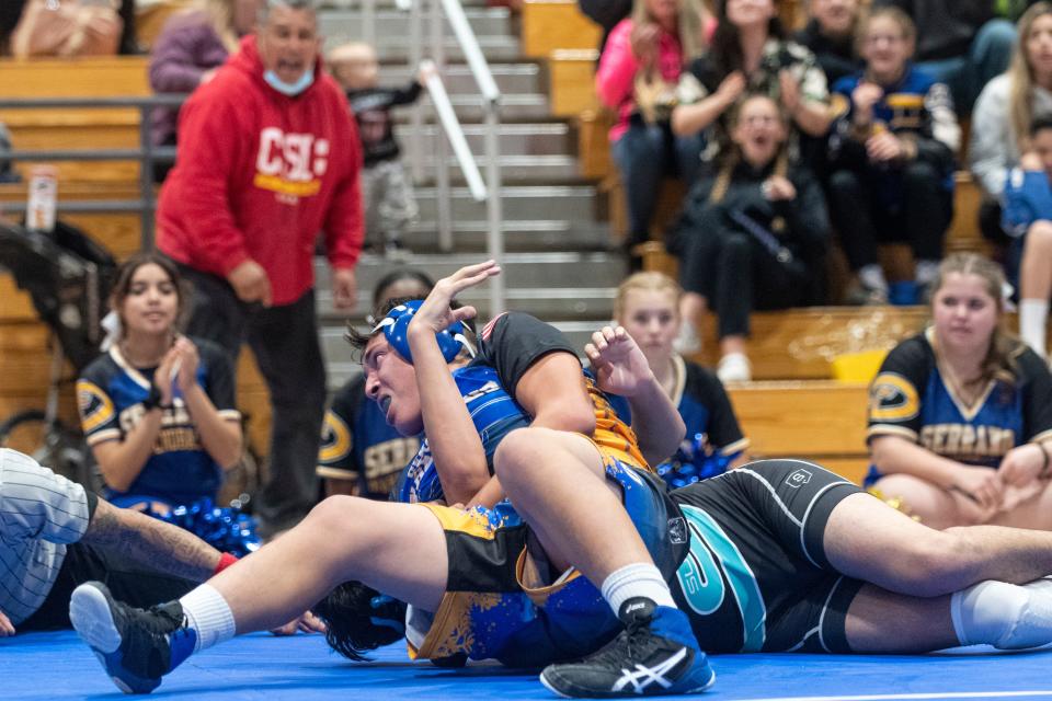 Serrano's Alex Martin pins Sultana's Derrick Salkeld during their 160-pound match in Phelan on Thursday, Jan. 13 2022. Martin's victory was a turning point in the Diamondbacks' comeback team victory.