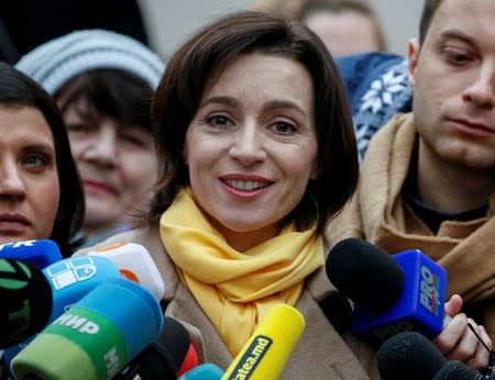 FILE PHOTO: Moldova's Action and Solidarity Party presidential candidate Sandu speaks to media after voting in presidential election in Chisinau