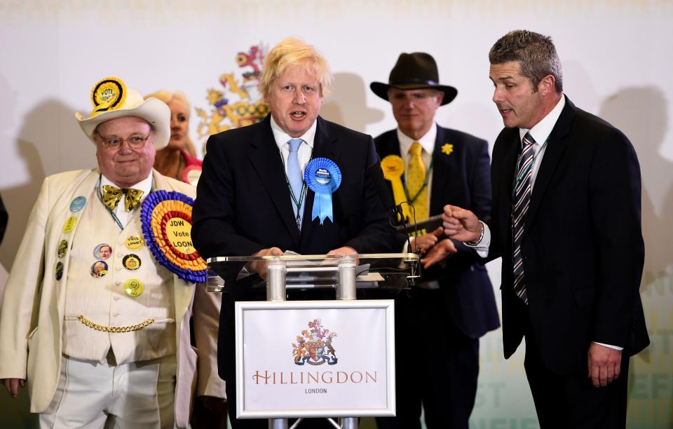 Independent candidate Michael Doherty (right) attempts to interrupt Mayor of London Boris Johnson as he makes a speech after winning the Uxbridge and South Ruislip seat during the General Election count at Brunel University, London.