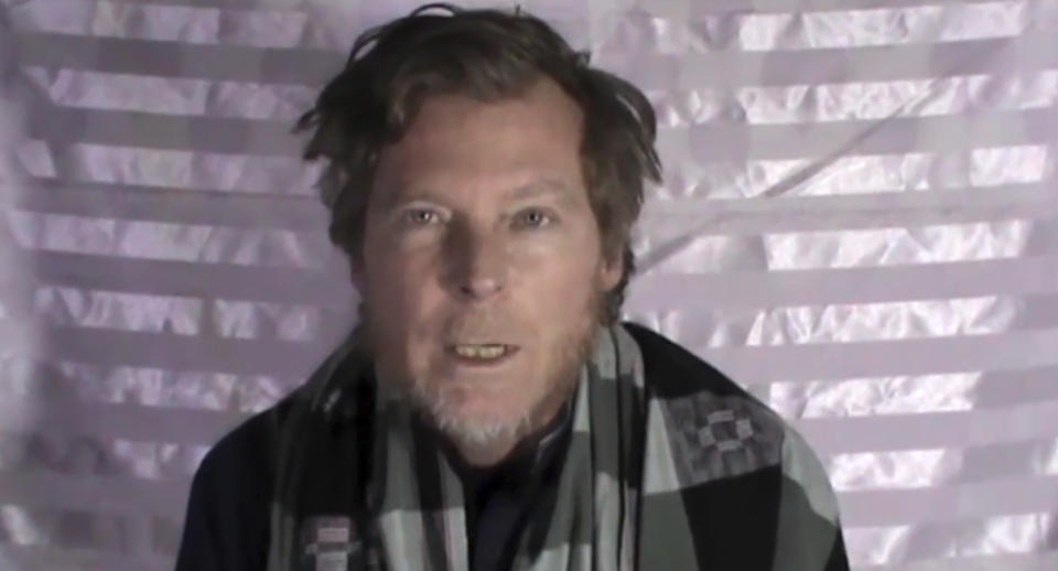 Australian Timothy Weekes in a video released by the Taliban with stubble and rough hair.