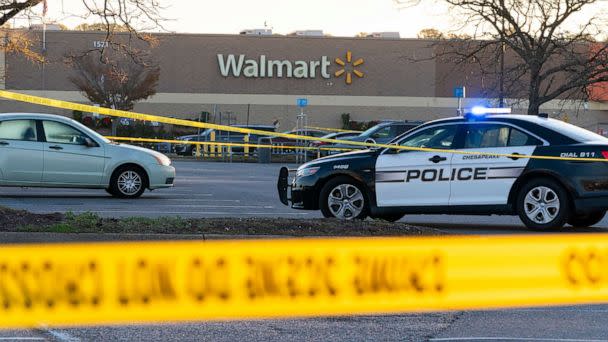 PHOTO: Law enforcement work the scene of a mass shooting at a Walmart, on Nov. 23, 2022, in Chesapeake, Va. The store was busy just before the shooting Tuesday night with people stocking up ahead of the Thanksgiving holiday. (Alex Brandon/AP)