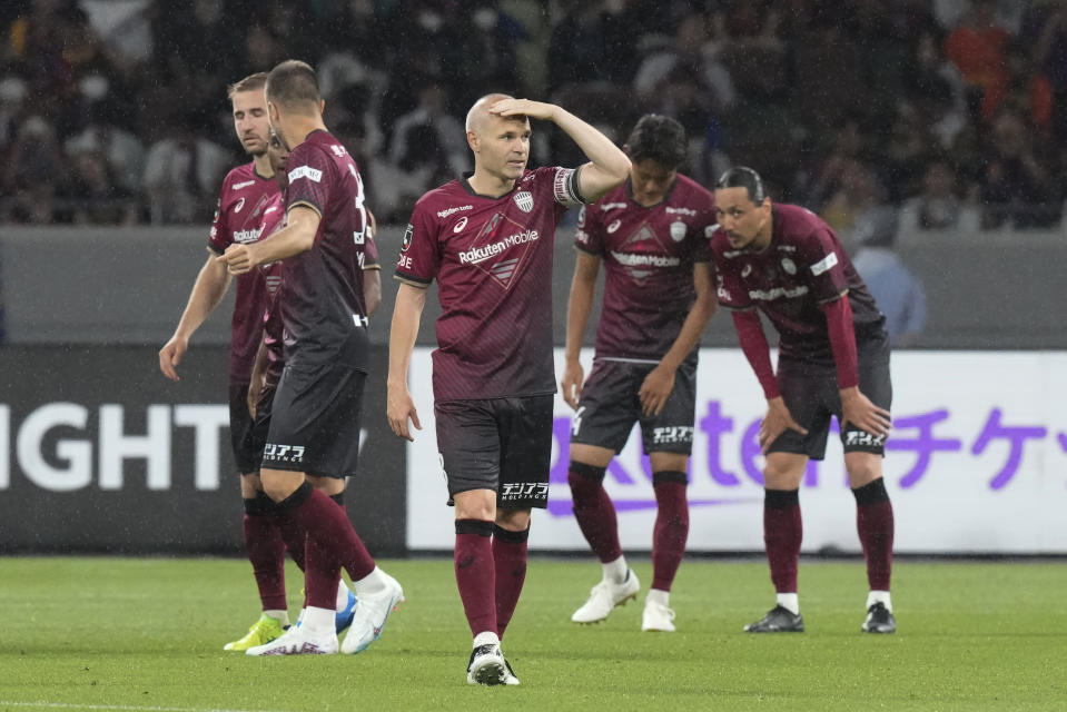 Vissel Kobe's Andres Iniesta looks on during a friendly soccer match between his Japanese club Vissel Kobe and his old club Barcelona at the National Stadium in Tokyo, Tuesday, June 6, 2023. (AP Photo/Eugene Hoshiko)