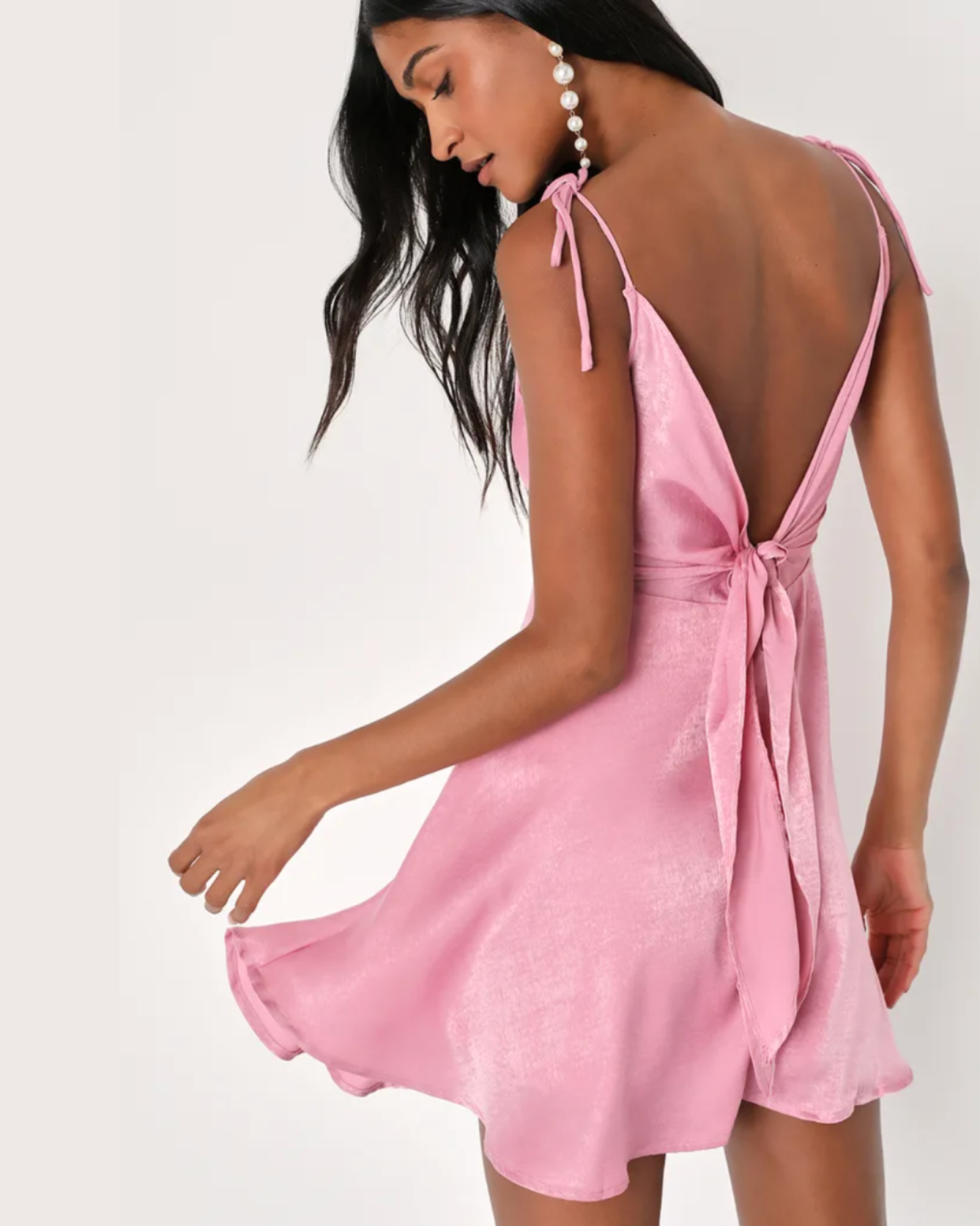 <p><a href="https://go.redirectingat.com?id=74968X1596630&url=https%3A%2F%2Fwww.lulus.com%2Fproducts%2Fparty-with-prosecco-pink-satin-tie-back-mini-dress%2F2115836.html&sref=https%3A%2F%2Fwww.seventeen.com%2Ffashion%2Fstyle-advice%2Fg401%2Fhomecoming-dresses%2F" rel="nofollow noopener" target="_blank" data-ylk="slk:Shop Now;elm:context_link;itc:0;sec:content-canvas" class="link rapid-noclick-resp">Shop Now</a></p><p>Party with Prosecco Pink Satin Tie-Back Mini Dress</p><p>$64.00</p><p>lulus.com</p>