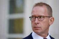 Mark Johnson, a British citizen who at the time of his arrest was HSBC's global head of foreign exchange cash trading, exits following a hearing at the U.S. Federal Court in Brooklyn, New York, U.S., August 29, 2016. REUTERS/Brendan McDermid