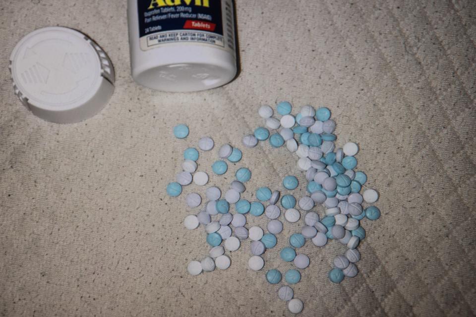 An evidence photograph taken by MHA Drug Enforcement agents shows fentanyl pills at a crime scene. 
