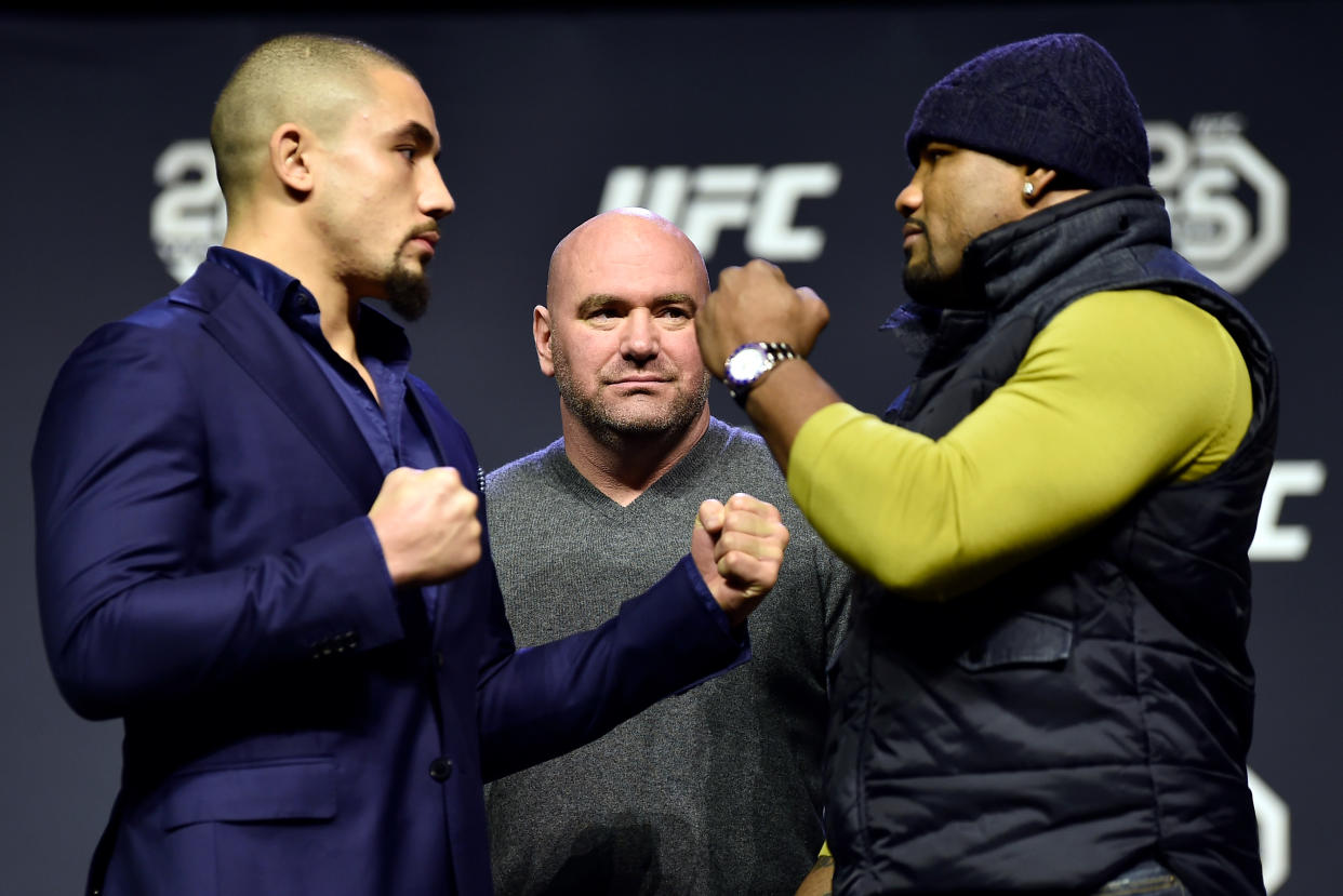 Robert Whittaker, left, and Yoel Romero face off during the UFC press conference. (Getty)