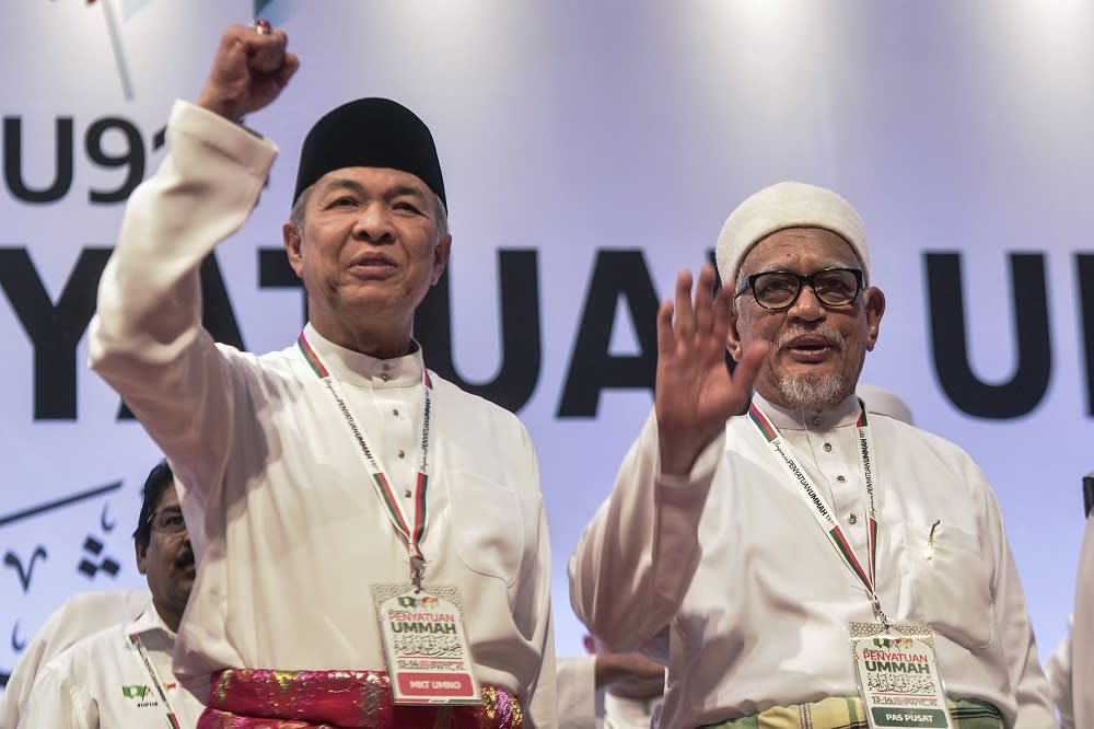 Umno president Datuk Seri Ahmad Zahid Hamidi and PAS president Datuk Seri Hadi Awang at the Himpunan Penyatuan Ummah (Muslim Unity Rally) held at the Putra World Trade Centre in Kuala Lumpur September 14, 2019. — Picture by Shafwan Zaidon