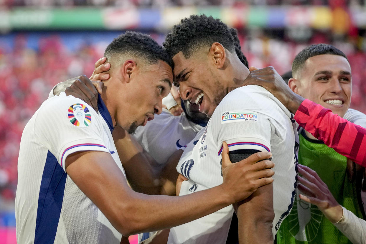 England's Jude Bellingham, right, and England's Trent Alexander-Arnold celebrate after a quarterfinal match between England and Switzerland at the Euro 2024 soccer tournament in Duesseldorf, Germany, Saturday, July 6, 2024. (AP Photo/Darko Vojinovic)