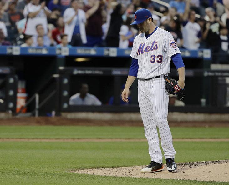 A frustrated Matt Harvey reacts Kyle Schwarber's two-run home run during Wednesday's game at Citi Field. (AP)