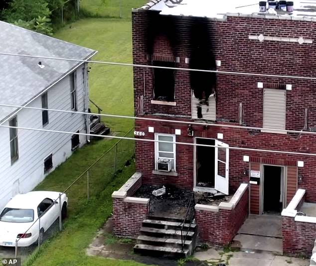 The remains of apartment complex on 560 North 29th Street in St. Louis that caught on fire at 3 a.m. on August 6, 2021. The fire claimed the life of Sabrina Dunigan, a single mother, five children. (Photo Cred: Associated Press)