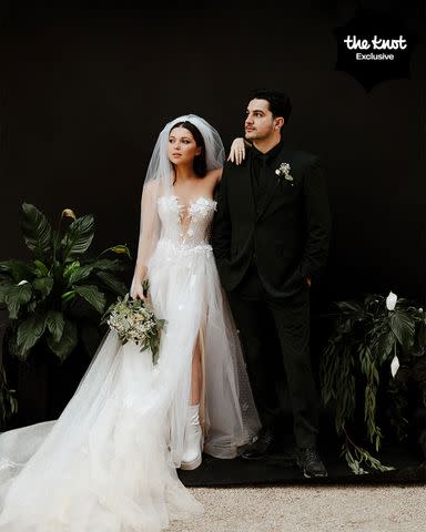 <p>Michelle Roller</p> Samantha Hanratty and Christian DeAnda pose on their wedding day.