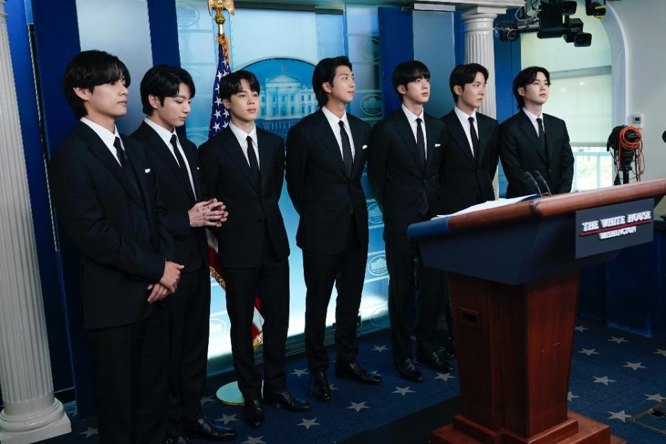 BTS join White House press secretary Karine Jean-Pierre during the White House’s daily briefing in Washington, D.C. on May 31, 2022. - Credit: AP Photo/Susan Walsh