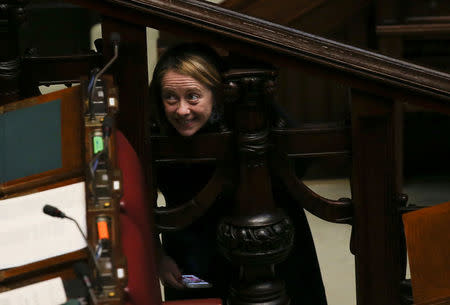 Fratelli D'Italia party leader Giorgia Meloni smiles before the final vote on gay and unmarried civil unions at the Italy's lower house of Parliament in Rome May 11, 2016. REUTERS/Alessandro Bianchi