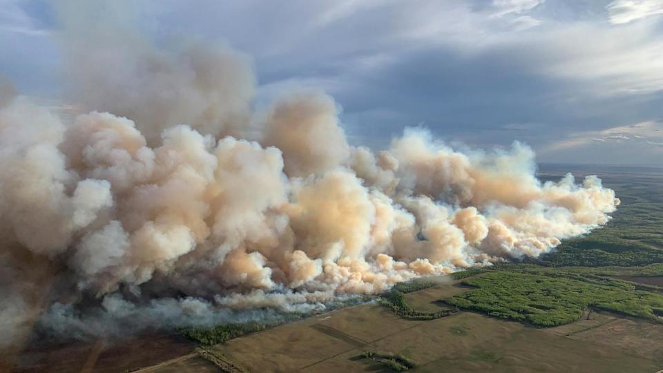 PHOTO: Smoke rises from mutual aid wildfire GCU007 in the Grande Prairie Forest Area near TeePee Creek, Alberta, Canada, May 10, 2024.  (Alberta Wildfire via Reuters)