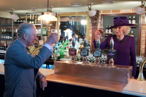 Cheers! Britain's Camilla, Duchess of Cornwall and Prince Charles, Prince of Wales enjoying a visit to a pub - pints may be hard to come by during the World Cup for England fans after a warning over a C02 shortage