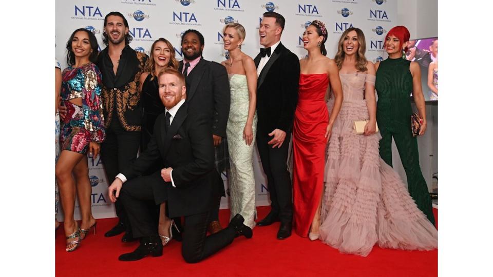 Michelle Tsiakkas, Graziano Di Prima, Jowita Przysta, Neil Jones, Hamza Yassin, Nadiya Bychkova, Kai Widdrington, Katya Jones, Amy Dowden and Dianne Buswell, accepting the Talent Show award on behalf of "Strictly Come Dancing", 