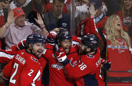 Capitals fans on their way watch Game 3 of the Stanley Cup Final had a close encounter with two of the team’s players. (AP)