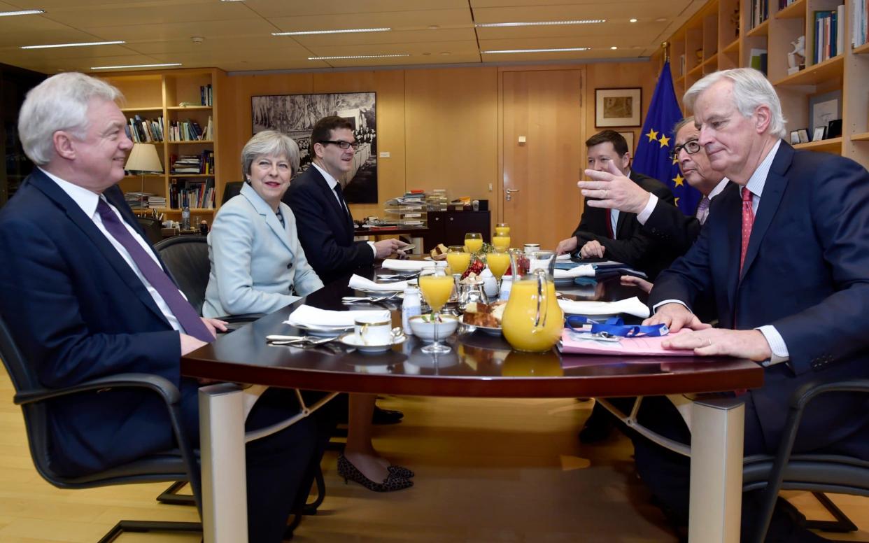 Secretary of State for Exiting the European Union David Davis, Britain's Prime Minister Theresa May, European Commission President Jean-Claude Juncker and European Union's chief Brexit negotiator Michel Barnier meet at the European Commissio - Reuters Pool