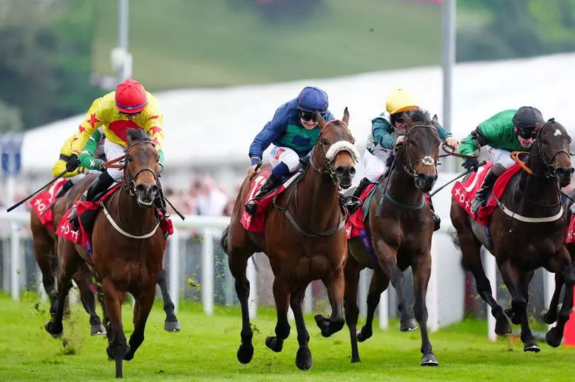 Knicks, ridden by jockey Joanna Mason (centre), on the way to winning the tote.co.uk Saddle-Up For More Than Racing Handicap on the first day of the 2024 Boodles May Festival at Chester Racecourse on Wednesday, May 8 2024