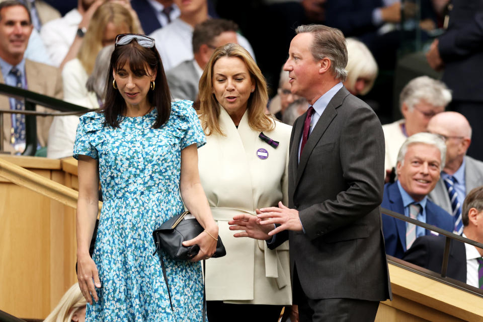 LONDON, ENGLAND - JULY 04: David Cameron, 
Former Prime Minister of the United Kingdom and his Wife, Samantha Cameron (L) take their seats in the Royal Box on Centre Court prior to the in the Women's Singles first round match between Shelby Rogers of United States and Elena Rybakina of Kazakhstan during day two of The Championships Wimbledon 2023 at All England Lawn Tennis and Croquet Club on July 04, 2023 in London, England. (Photo by Clive Brunskill/Getty Images)