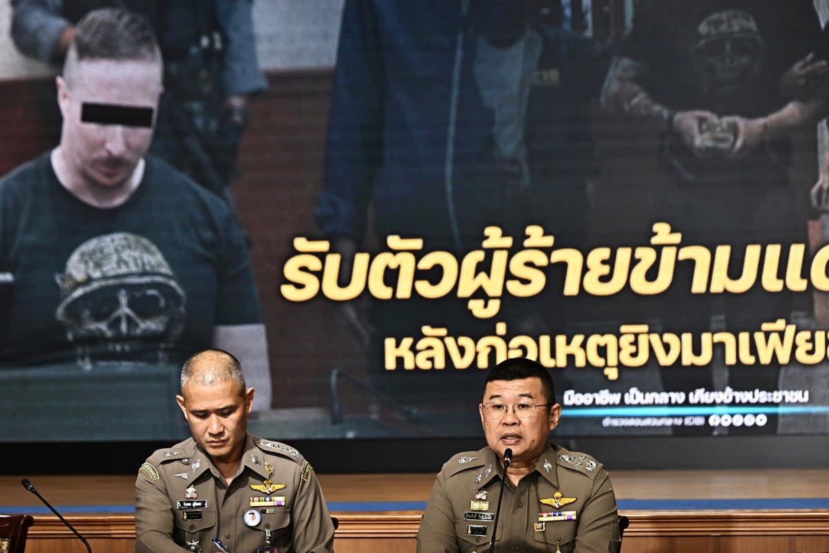 National police chief Damrongsak Kittiprapas (right) speaks during a press conference regarding the extradition of Matthew Dupre (on screen), a Canadian man wanted over the suspected murder of gangster Jimi ‘Slice’ Sandhu in Phuket on 4 February 2022, at the Crime Suppression Division in Bangkok, Thailand on 29 May 2023 (AFP via Getty Images)