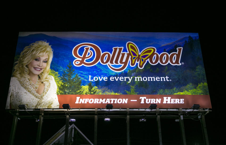 PIGEON FORGE, TN - OCTOBER 18:  A billboard on The Parkway promotes Dolly Parton's Dollywood as viewed on October 18, 2016 in Pigeon Forge, Tennessee. Located near the entrance to Great Smoky Mountains National Park, this tourist resort community is home to Dollywood and other entertainment and roadside attractions. (Photo by George Rose/Getty Images)