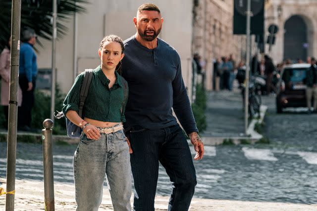 <p>Graham Bartholomew/Prime</p> Chloe Coleman and Dave Bautista in 'My Spy The Eternal City'