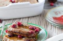 <p>A complete brunch menu requires both sweet and savory dishes - this baked cranberry French toast covers the sweet side. Save yourself some time in the morning and prepare the dish the night before: Just layer the slices of bread in the bottom of a baking dish and pour in a mixture of coconut milk, almond milk, maple syrup, eggs, and spices and leave in the refrigerator for up to twelve hours. All you have to do the next day is toss the dish in the oven for thirty minutes covered and another thirty minutes uncovered. Baking the French toast also saves you the hassle (and health hazard) of frying it on the stovetop with tablespoons of butter. </p><p><a href="https://www.thedailymeal.com/recipes/baked-cranberry-french-toast-recipe" rel="nofollow noopener" target="_blank" data-ylk="slk:Click here for the Baked Cranberry French Toast recipe.;elm:context_link;itc:0;sec:content-canvas" class="link "><b>Click here for the Baked Cranberry French Toast recipe.</b></a> </p>