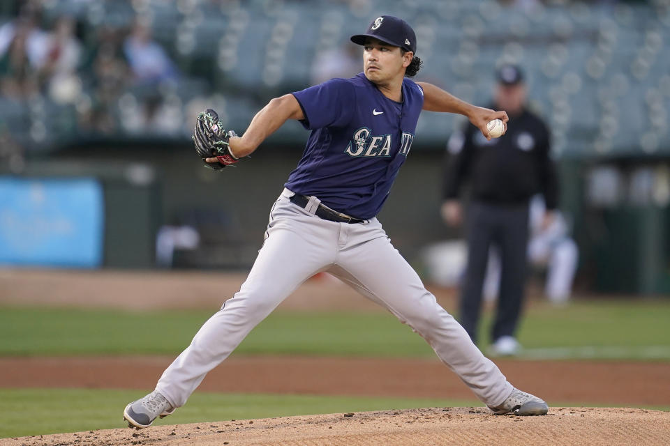 Seattle Mariners' Marco Gonzales pitches against the Oakland Athletics during the first inning of a baseball game in Oakland, Calif., Friday, Aug. 19, 2022. (AP Photo/Jeff Chiu)