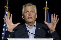 FILE In this Oct. 15, 2021 file photo, Democratic gubernatorial candidate Terry McAuliffe gestures during a rally in Richmond, Va. McAuliffe won Virginia's 2013 governor's race by embracing his own brand of personal politics that rely on decades-old friendships, back-slapping charisma and tell-it-like-it-is authenticity. (AP Photo/Steve Helber, File)