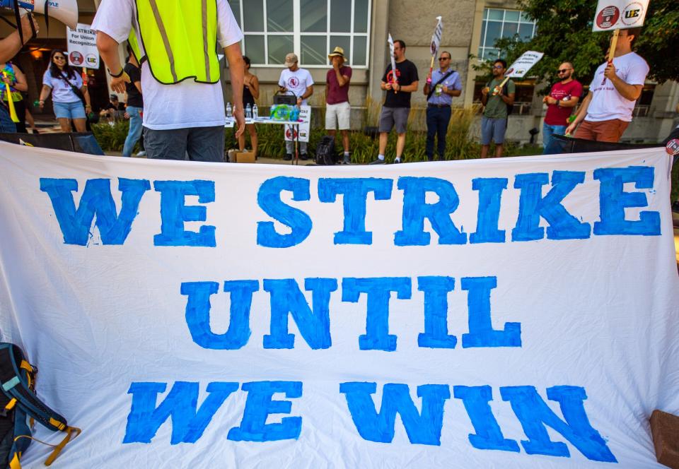 Graduate students and their supporters stand outside of Memorial Stadium where the IU trustees were in executive session. The demonstration was part of a strike pledge launch party on Thursday, Aug. 11, 2022.