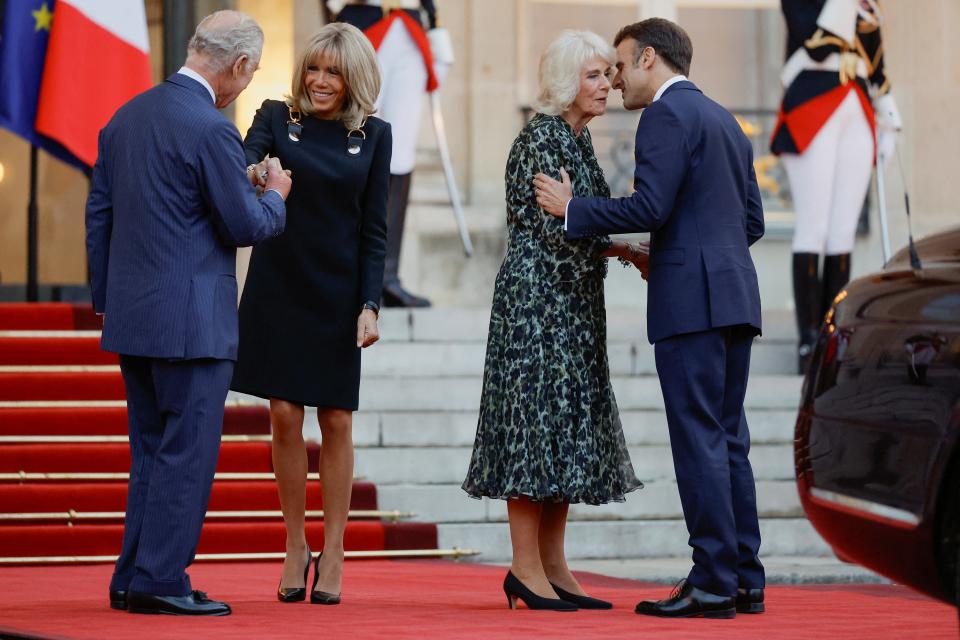 Britain's King Charles and Queen Camilla depart following a meeting with French President Emmanuel Macron and his wife Brigitte Macron at the Elysee Palace in Paris (REUTERS)