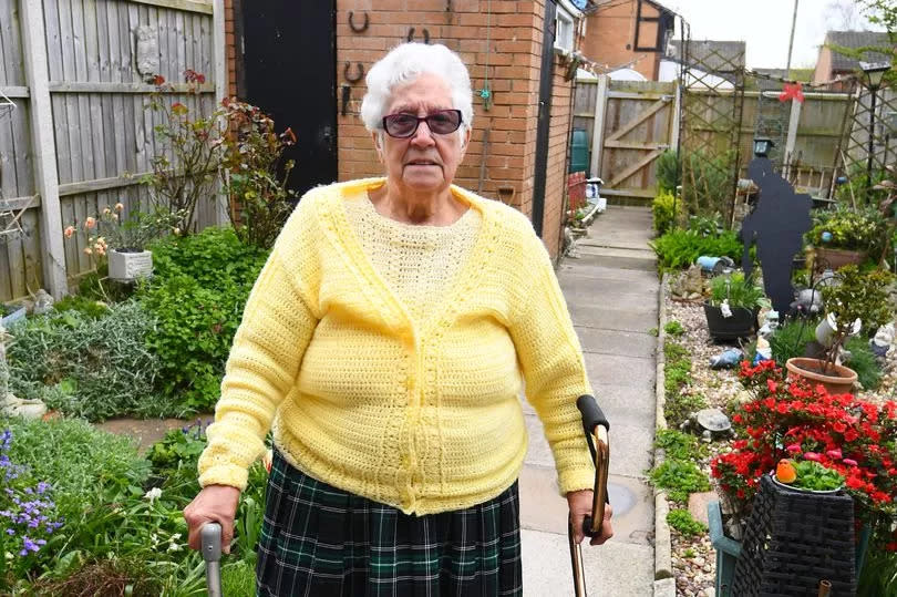 Patricia Toole in her garden