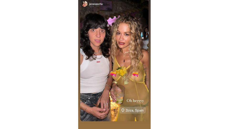 Rita reposted a photo to her Instagram story in a sheer yellow dress