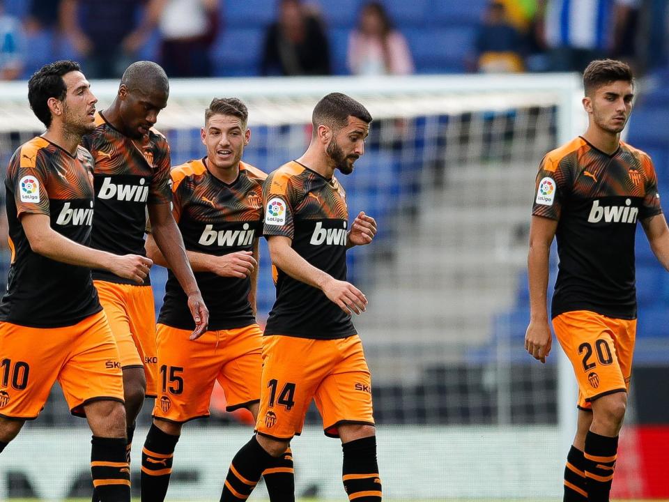 Valencia captain Dani Parejo (far left) and Ferran Torres (far right) apparently did not have the best relationship: Getty Images