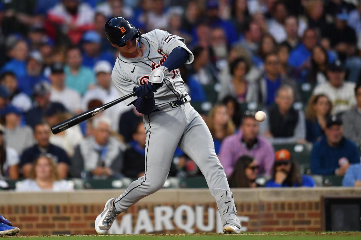 Detroit Tigers catcher Dillon Dingler hits an RBI single during the second inning against the Chicago Cubs at Wrigley Field in a game on Tuesday, Aug. 20, 2024, in Chicago.