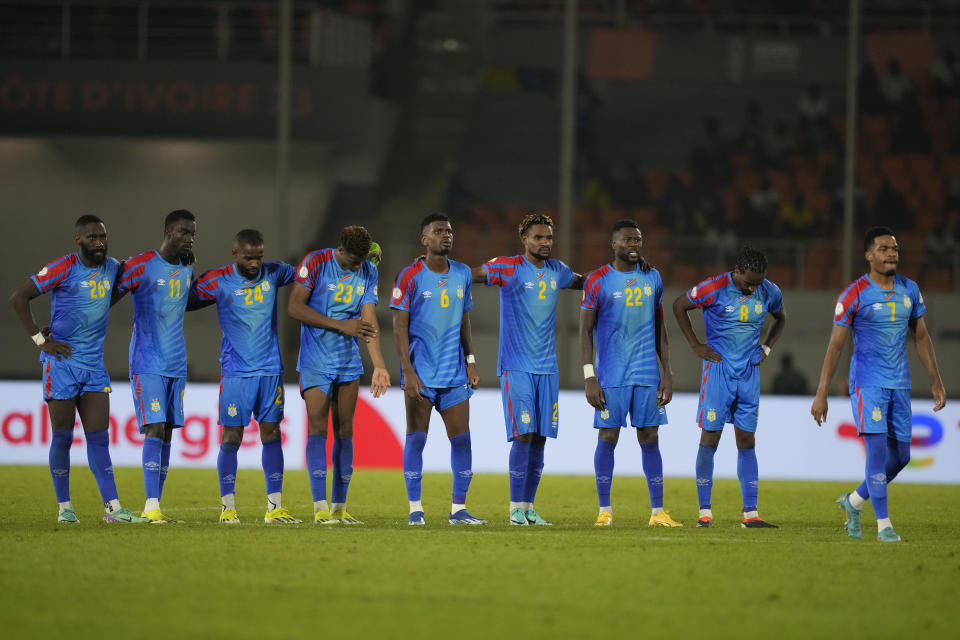 DR Congo players watch the penalty shootout during the African Cup of Nations Round of 16 soccer match between Egypt and DR Congo, at the Laurent Pokou stadium in San Pedro, Ivory Coast, Sunday, Jan. 28, 2024. 2024. (AP Photo/Sunday Alamba)