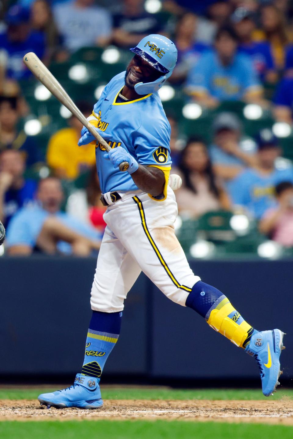 Brewers designated hitter Andrew McCutchen is hit by a pitch during the eighth inning Friday night.