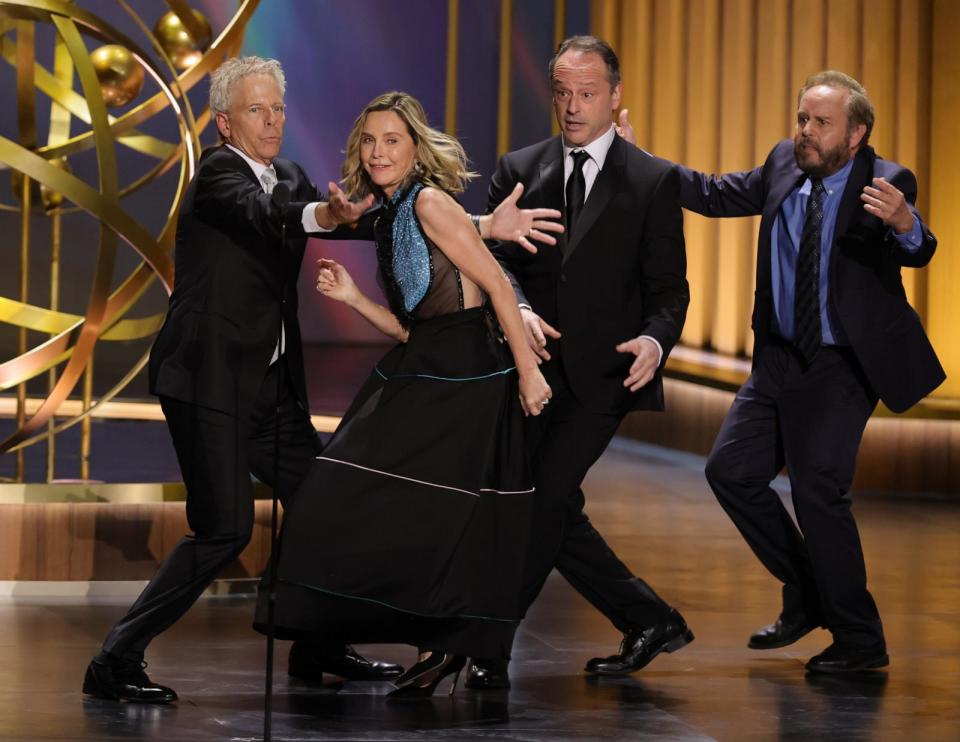 PHOTO: (L-R) Greg Germann, Calista Flockhart, Gil Bellows and Peter MacNicol dance onstage during the 75th Primetime Emmy Awards at Peacock Theater on Jan. 15, 2024 in Los Angeles. (Kevin Winter/Getty Images)