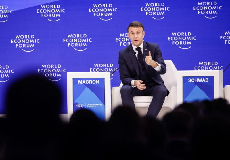 French President Emmanuel Macron speaks at an event during the World Economic Forum Annual Meeting 2024 in Davos-Klosters. Hannes P. Albert/dpa